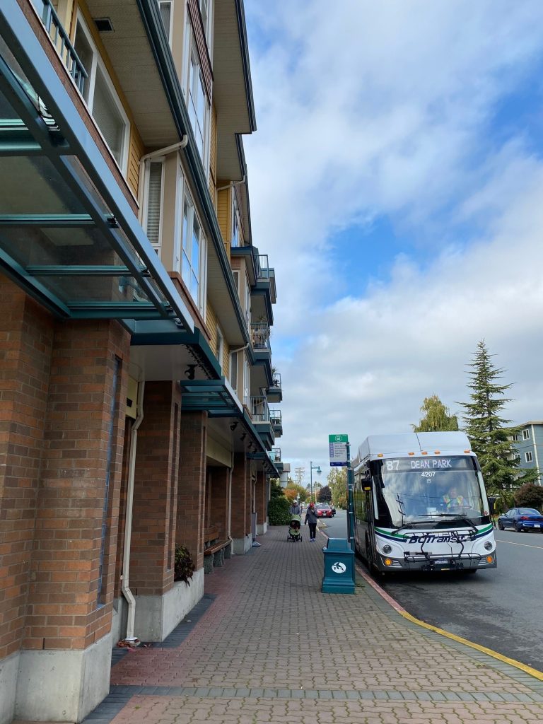 Public Bus stopped at corner of Fifth St and Sidney Ave