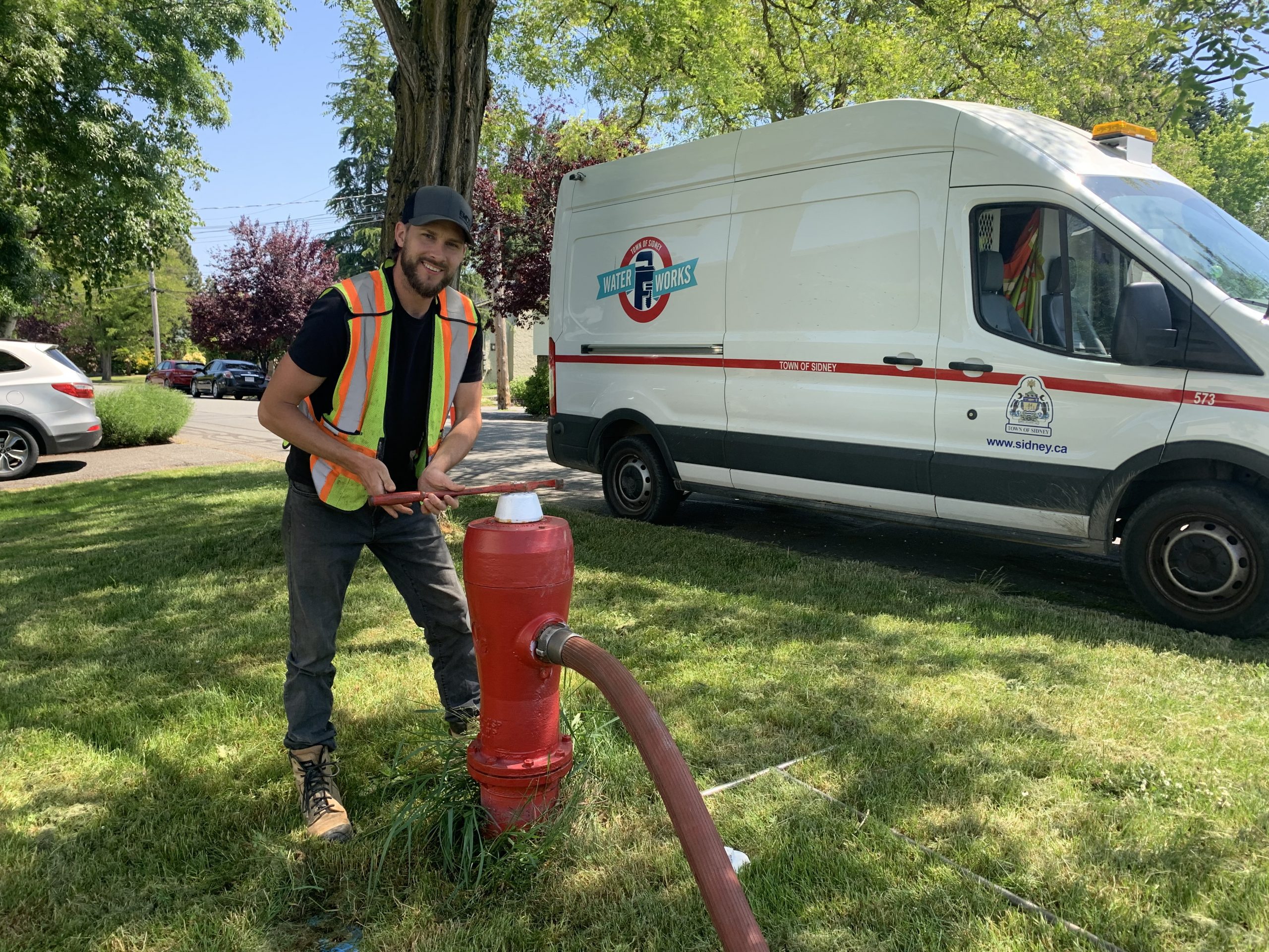 Staff member undertaking watermain flushing