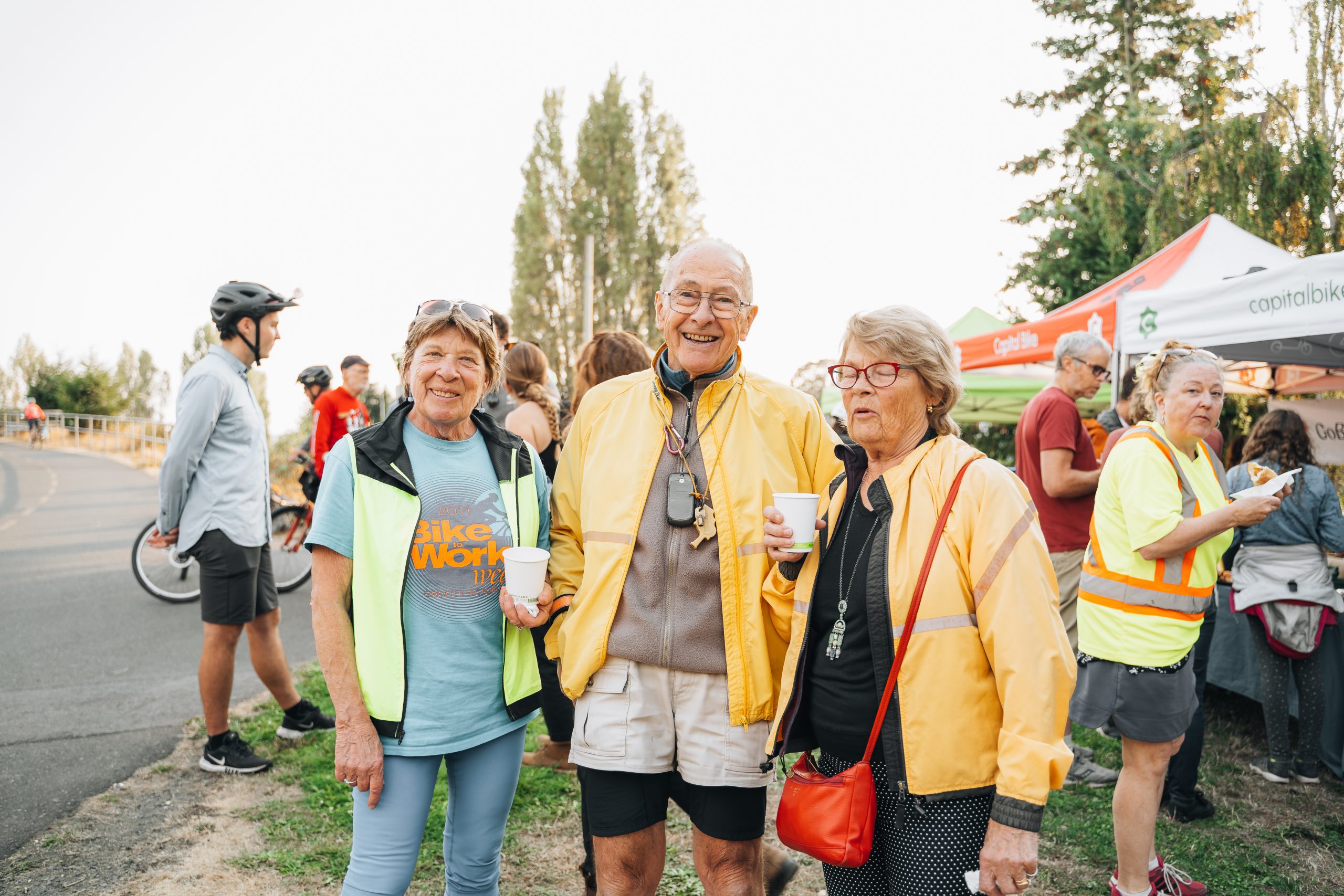 Happy Go by Bike Week participants smiling at camera.