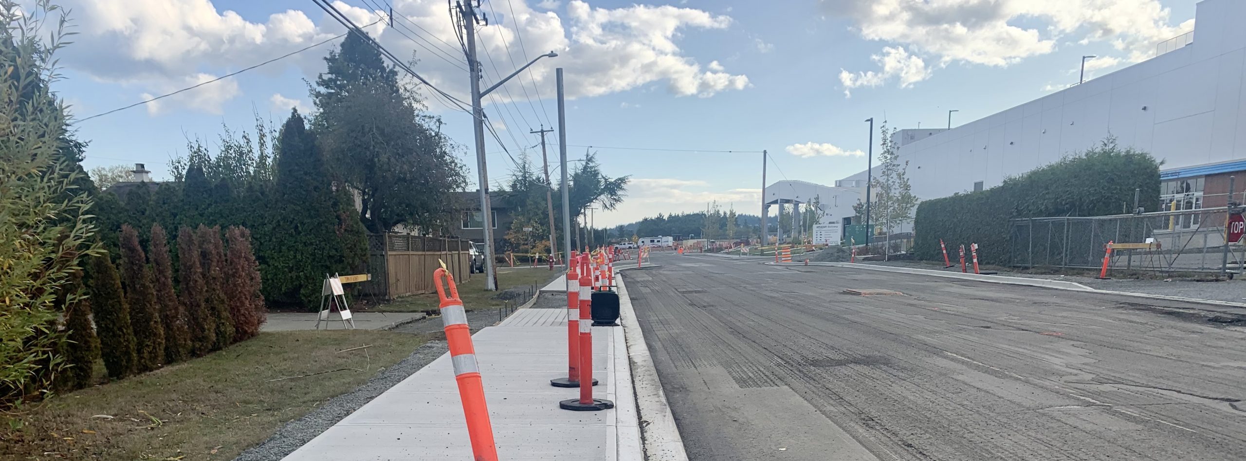 Galaran construction underway. New sidewalk with pilons