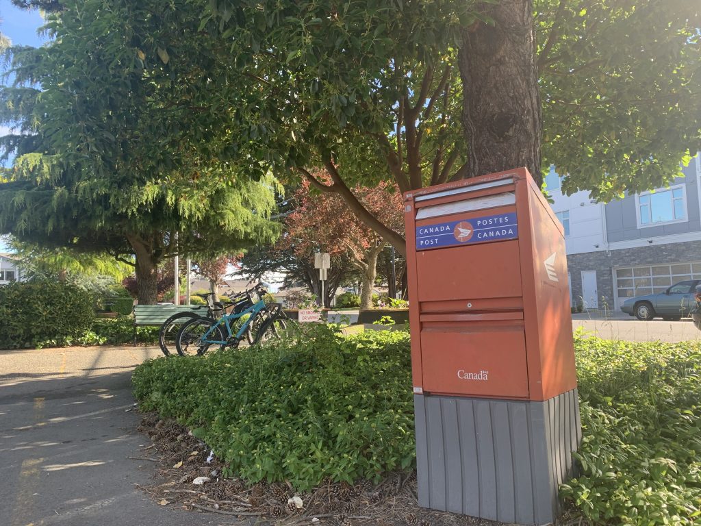 Red Canada Post box by Drivers Services