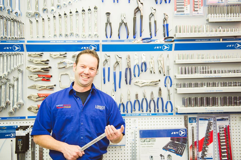 Worker in front of tools